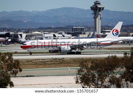 LOS ANGELES, CALIFORNIA, USA - APRIL 17 : China Cargo Airlines Boeing 777-F6N taxis at Los Angeles Airport on April 17, 2013. It has the most powerful jet engines in commercial service.