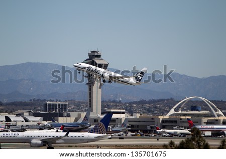 LOS ANGELES, CALIFORNIA, USA - APRIL 17 : Alaska Airlines Boeing 737-890 takes off from Los Angeles Airport on April 17, 2013. The plane has a range of 5,765 km and a maximum speed of 544 mph