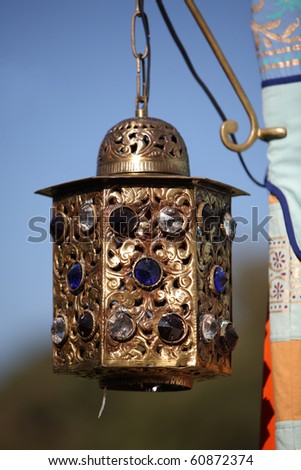 Golden Buddhist jeweled hanging lantern