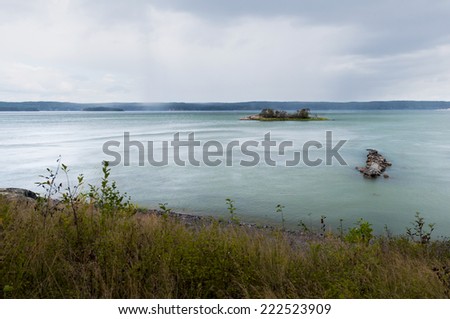 The summer rainy landscape with clouds and the sea, Sweden