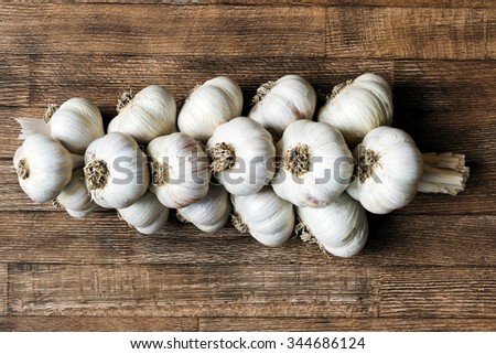 Bunch of garlic on a wooden board