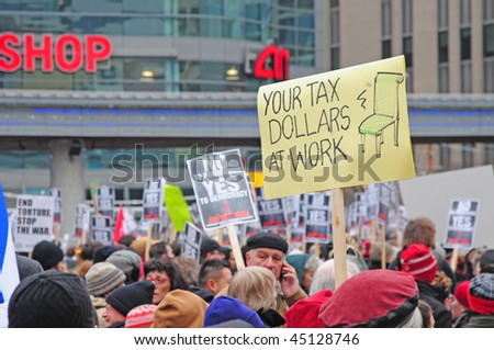 TORONTO - JANUARY 23:  People at a rally protesting against Prime Minister Harper\'s decision to prorogue Parliament on January 23, 2010 in Toronto, Ontario.