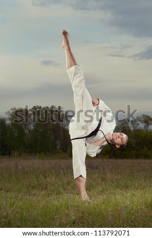 Very high karate kick