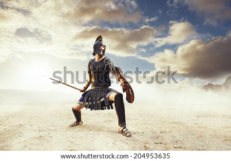 Angry ancient Greek warrior fighting in the combat