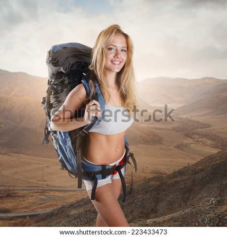Hiker portrait. Female hiking woman happy and smiling during hike