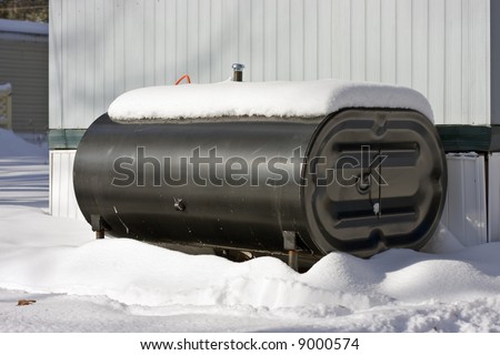 Home heating oil tank outside of house