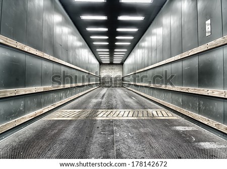 Grungy background shot of green car elevator