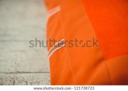 Background closeup textile of orange pet mattress