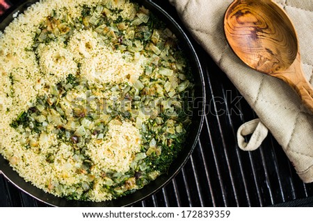 Couscous is a traditional Berber dish of semolina which is cooked by steaming. It is traditionally served with a meat or vegetable stew spooned over it