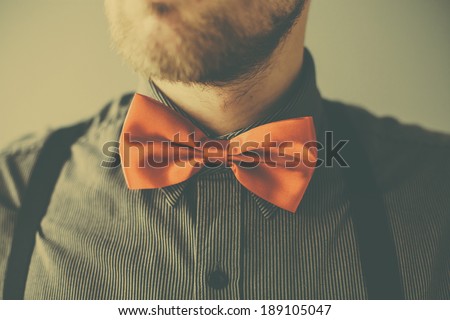 Vintage fashion man with red tie and beard
