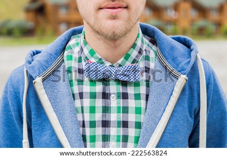 Portrait of bearded young man in fashion styled bowtie and dress shirt