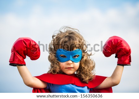 stock-photo-superhero-kid-wearing-boxing