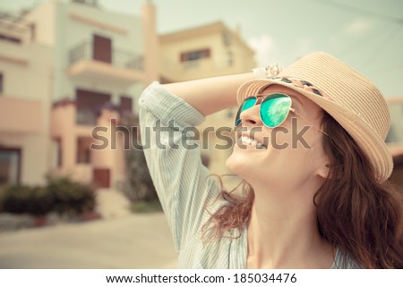 Hipster girl in summer city