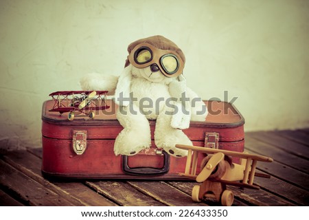 Vintage toys in nursery. Travel and adventure concept. Retro toned