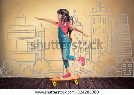Kid with jet pack riding on skateboard. Child playing at home. Success, leader and winner concept