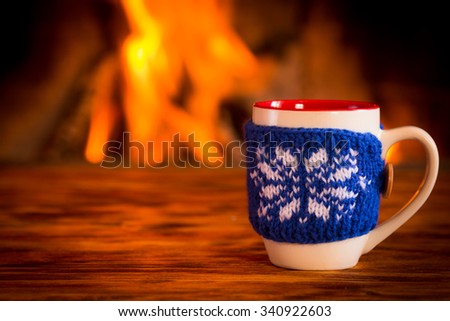 Christmas ornament near fireplace. Winter holiday concept