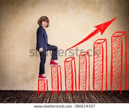Portrait of child businessman in office. Success, creative and growing business concept