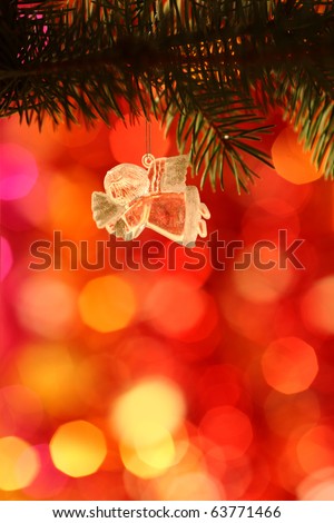 Vintage Christmas Angel against light blurred background