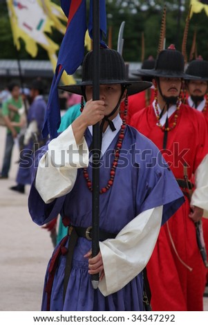 SEOUL - JULY 25: Royal guards holding swords during the changing of the guard ceremony at Gyeongbokgung Palace July 25, 2009 in the Republic of Korea