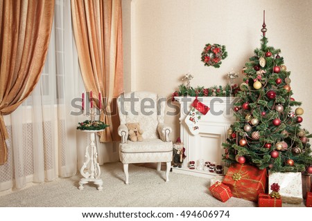 Christmas and New Year Room Interior Design, Xmas Tree Decorated by baubles, lights, tree topper, Presents, stockings, santa, toys and Garland and Indoors Fireplace
