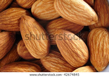 pile of almond nut. macro close up and top eye view
