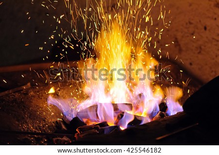 Forge fire Forge fire used for creating iron tools in blacksmith\'s.