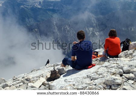 Couple looking over mountains