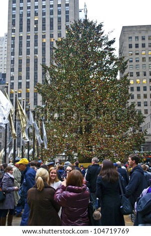 NEW YORK - DECEMBER 26: Holiday crowds around the Christmas Tree in Rockefeller Center on December 26, 2011 in  New York City.