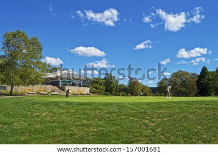 The clubhouse and putting green at a public golf course, part of the Monmouth County Park System in New Jersey.
