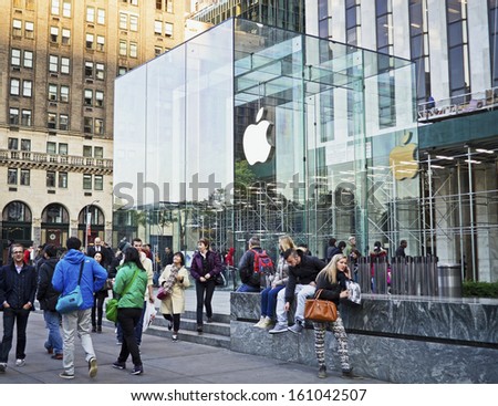 NEW YORK - OCTOBER 29: The Apple Store on 5th Avenue on October 29 2013 in New York City. The 5th Ave Apple Store is the flagship subterranean location in New York City.