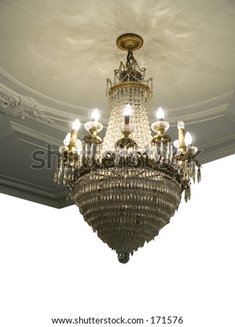 This is a silo drop-out white shot of an old chandelier and ceiling at an old theatre in New York.