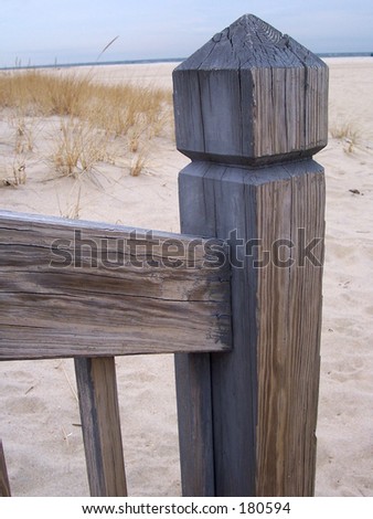 This is a shot of a fence post\
\
on the beach.