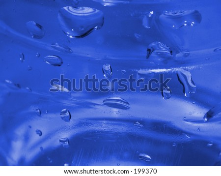 Blue Water Droplets on Plastic\\
\\
This is a close-up of some water droplets on plastic.