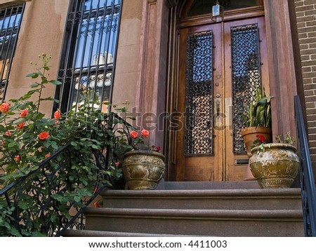 A front porch on an old New York City brownstone home.