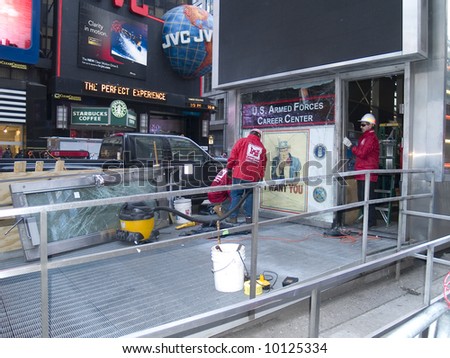 Emergency operations workers clean up evidence after the Times Square bombing on March 6th 2008.