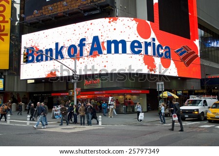 NEW YORK - FEB 27: Pedestrians walk past a Bank of America sign in Times Square on February 27, 2009 in New York City. The bank is rumored to be next in line for government infusion of equity.