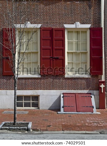 A row home in historic old Philadelphia with brick sidewalks.