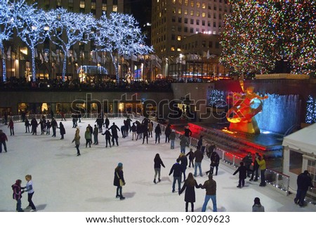 NEW YORK-DEC 2: Ice skaters and tourists are all around the famous Rockefeller Center Christmas tree on December 2, 2011.