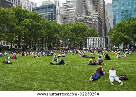 NEW YORK - June 16: People enjoying a nice day in Bryant Park on June 16, 2011 in New York City. Bryant Park is a 9,603 acre privately managed park in the center of Manhattan.