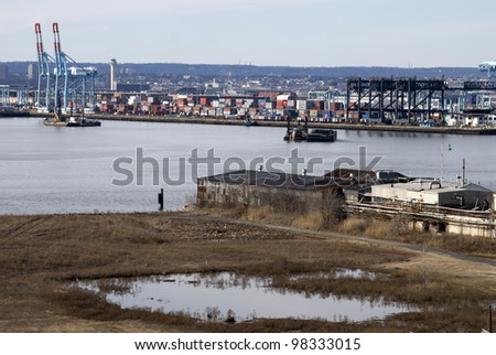 BAYONNE, NJ/USA-MARCH 9: A view of Port Newark and The MAERSK shipping containers on March 9, 2012 in Bayonne, NJ. The MAERSK Line is one of the largest International shipping companies in the world.