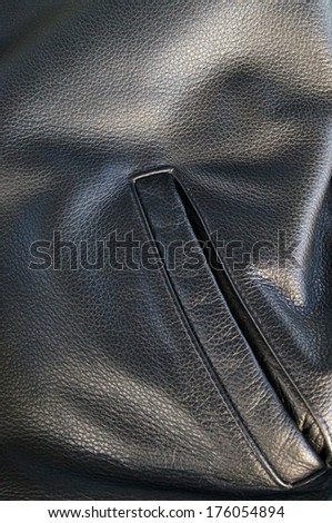 close up of side pocket of buffalo hide motorcycle jacket showing detail.
