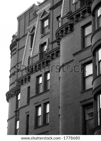 shows upper windows of resdiential building in downtown boston massachusetts