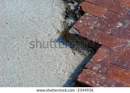 zig zag of bricks laid on top of cement