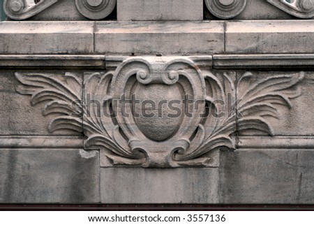 detail of upper ledge of ornate building in downtown boston massachusetts