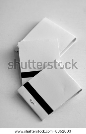 three blank white match books on white background, ready to ad your text