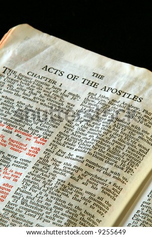 Bible Series. close up detail of antique holy bible open to the gospel according to the acts of the apostles in the new testament