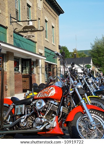 outside biker bar named whiskerz pub in easthampton massachusetts with row of motor cycles