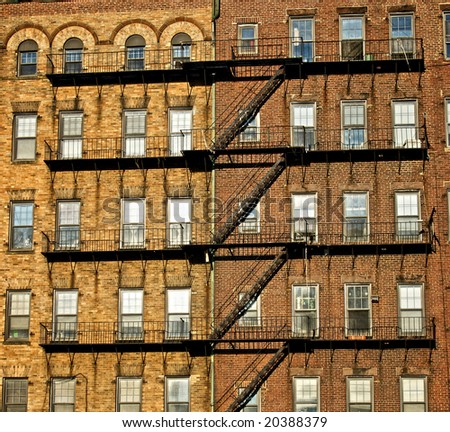 fire escapes on old tenement buildings in boston massachusetts seemingly attaching the buildings together