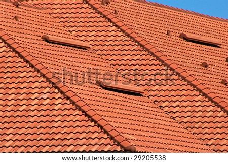 close up image of orange roof tops showing zig zag pattern