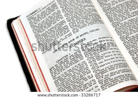 holy bible open to the fourth book of moses called numbers, on white